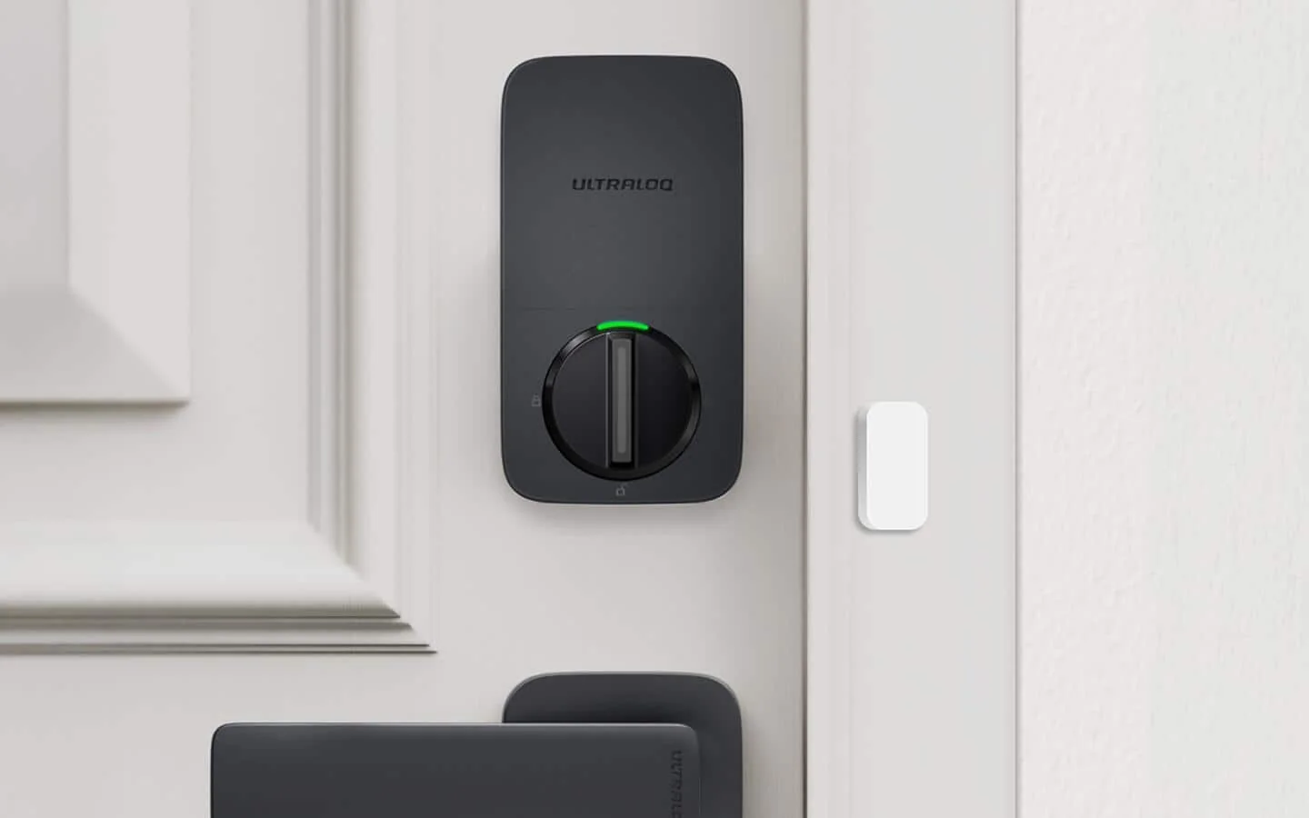 A discreet smart lock fitted to a modern interior door